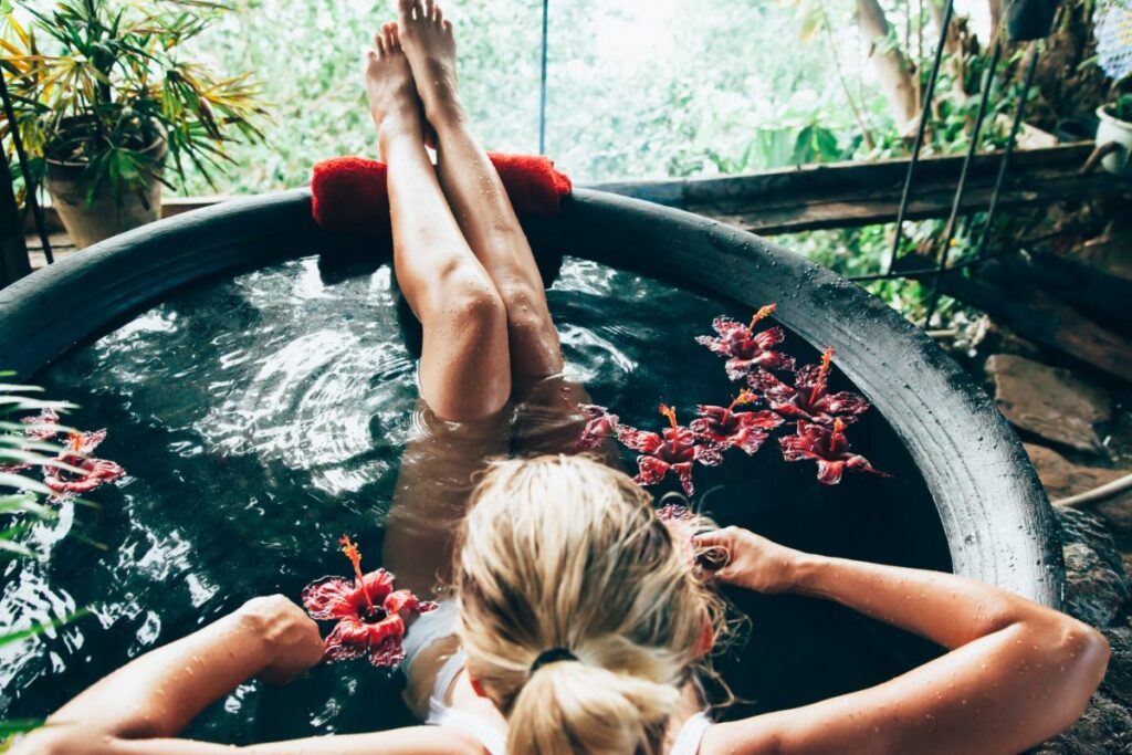 woman lounging in tub