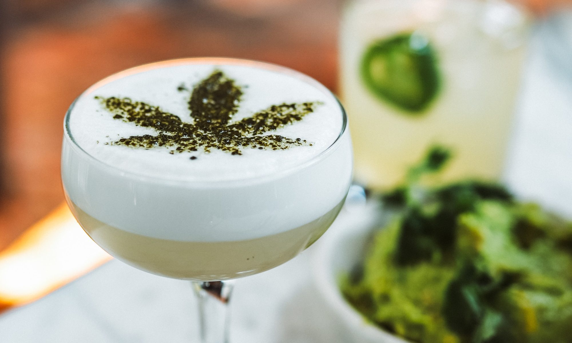 cocktail with cannabis leaf design